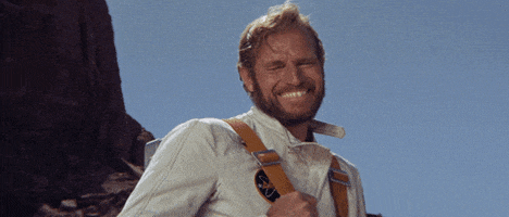 Heston Laughing.gif